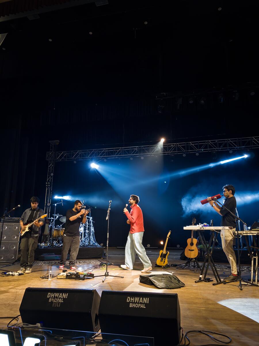 Moving head spotlights focused on stage